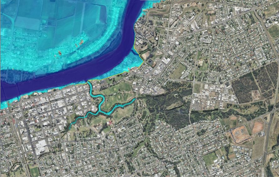 Map showing computer-generated flood water across Bundaberg North, but no water behind the levee wall in Bundaberg East, South and CBD.
